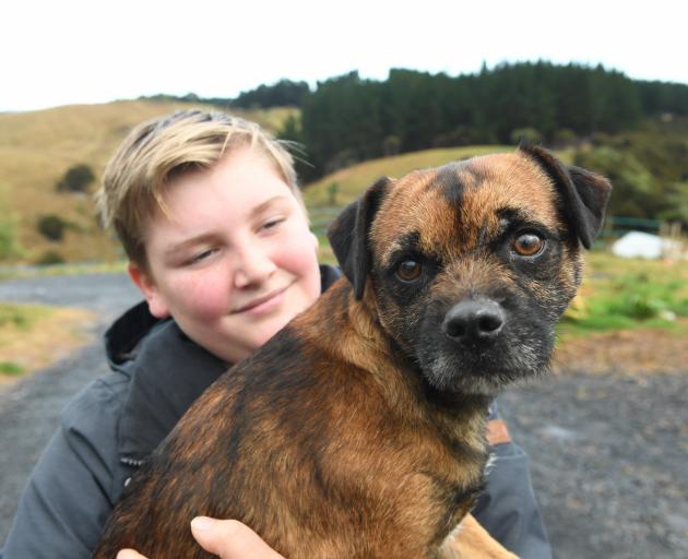 Holding Scruff is Quinn Newman (11).