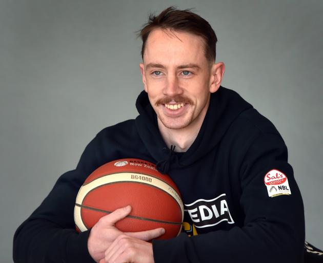 Otago Nuggets point guard Darcy Knox takes a break at the Edgar Centre yesterday as he prepares...