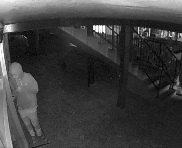 CCTV footage of an intruder attempting a break-in captured on a neighbour’s  security camera,...