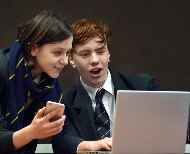 Bayfield High School pupils Veronika Luthar and Bradyn Brown (both 17) practise their computer...