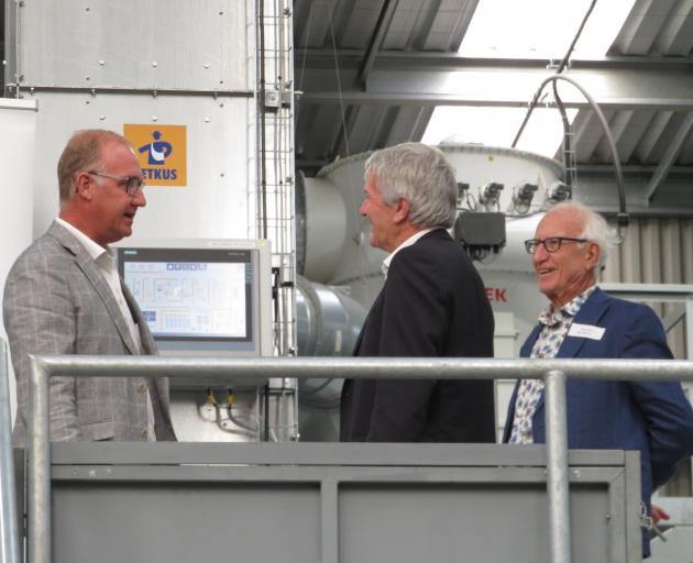 Vincent Luisetti (left) chats to Damien O'Connor and Max Luisetti during the official opening of...