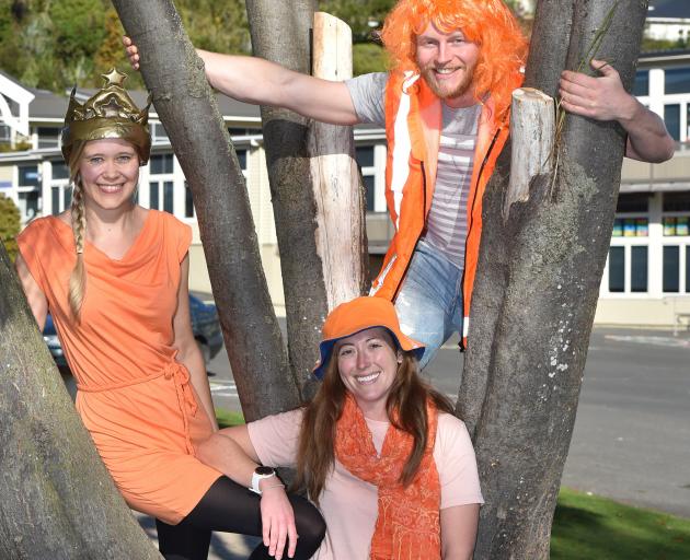 Celebrating King’s Day at North East Valley Normal School on Saturday were (back, left) Judith...
