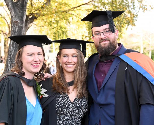 Nadine Terry (left), Phoebe Begg and Danny Maloney prepare to graduate from the University of...