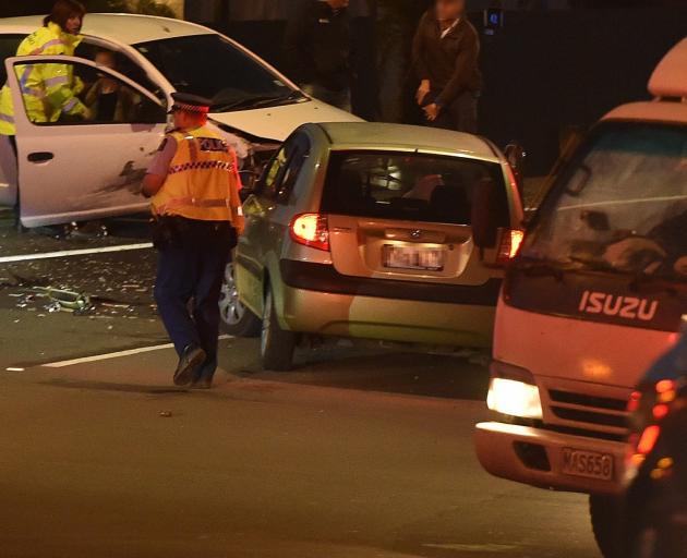Emergency services attend a crash in Kenmure Rd this evening. Photo: Gregor Richardson