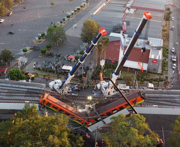 Mexico City's newest metro line collapsed on Tuesday, sending a train plunging onto a busy road...