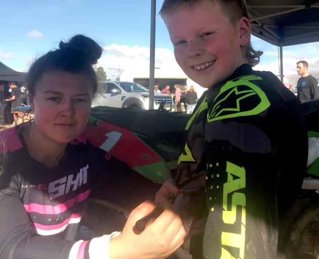 Double World Women’s Motocross champion Courtney Duncan signs 9-year-old Cromwell fan Charlie...