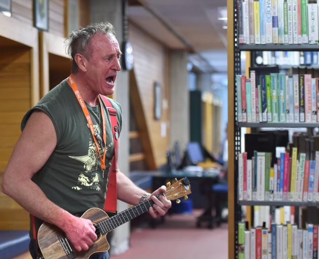 Michael Wingfield (also known as Kathartipuss) makes some noise at the library. 