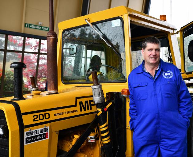 Thornbury Vintage Tractor and Implement Club president Fraser Pearce stands with Bert the tractor...