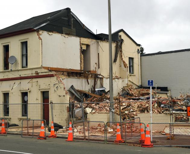 Demolition work started and then stopped at the former Scribes bookshop in North Dunedin. PHOTO:...
