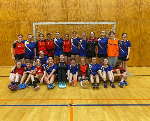 The Otago and Canterbury women's handball teams pose after competing in the South Island Shield...