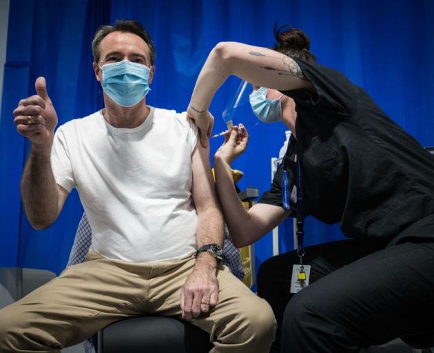 Victoria's Opposition leader Michael O'Brien receives his Covid jab from nurse Carly Underwood at...