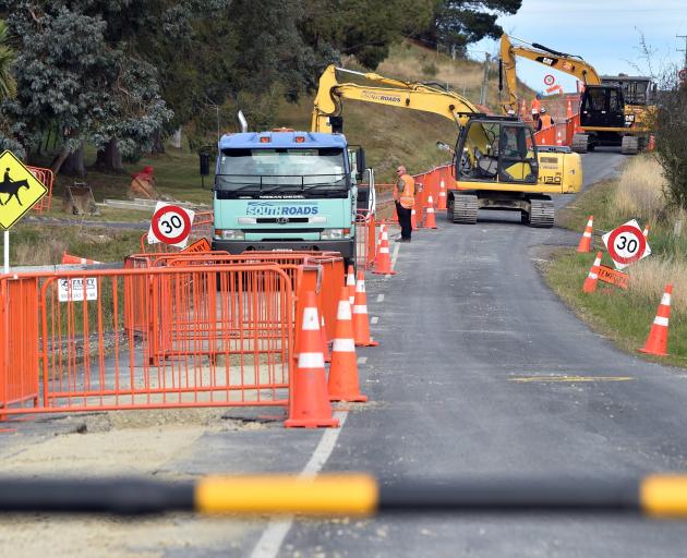 Construction crews work on the installation of a new water pipeline in Waikouaiti. PHOTO: PETER...