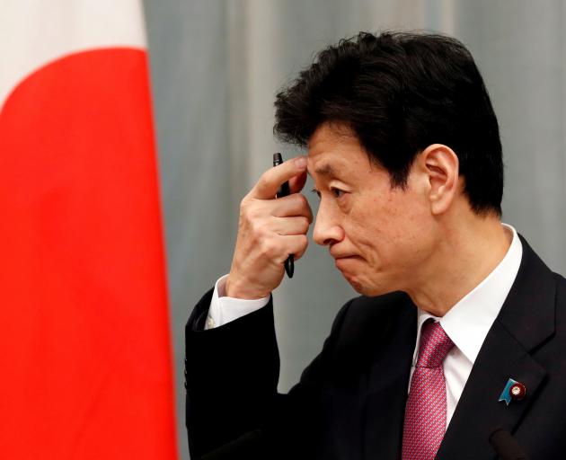 Economy Minister Yasutoshi Nishimura. Photo: Reuters 