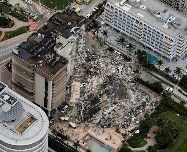 An aerial view showing a partially collapsed building in Surfside near Miami Beach. Photo: Reuters