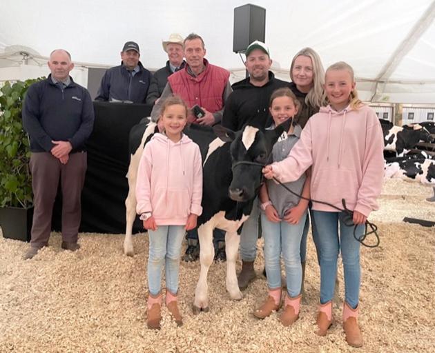 PGG Wrightson national dairy sales manager Jamie Cunninghame,   Andrew Reyland (PGGW), auctioneer...