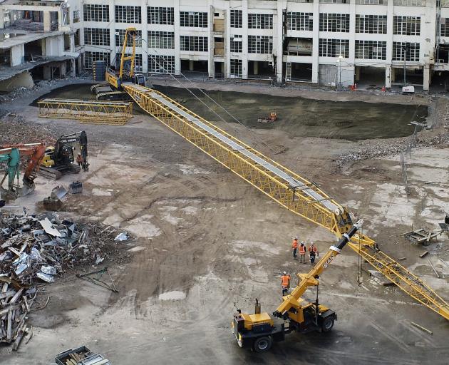 The boom of a large crane nicknamed ‘‘Stretch’’, which is being assembled at the site of the new...