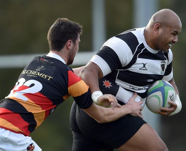 Southern prop Michael Mata’afa tries to break the tackle of Zingari-Richmond replacement back...