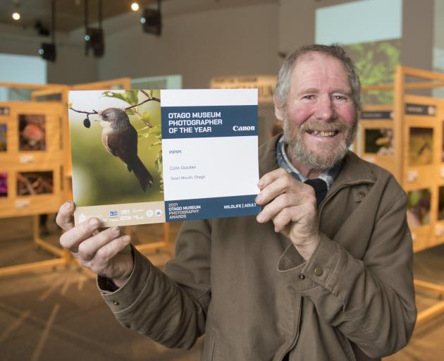 Otago Museum Photographer of the Year Colin Gosden displays his prize-winning picture of the...