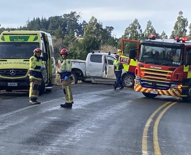 Emergency services at the scene of a crash at Three Mile Hill today. Photo:  Stephen Jaquiery