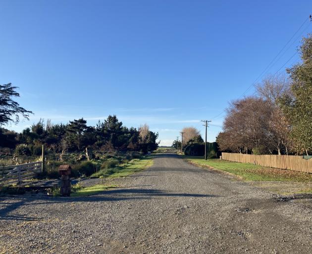 The northern section of Palmerston Rd is dusty in summer and potholed in winter. PHOTO: MATTHEW...