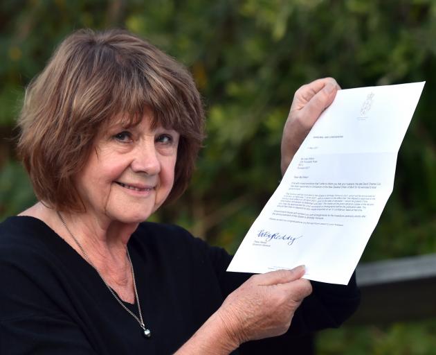 Joan Wilson, wife of the late Dave Cull, with a letter from Governor-General Dame Patsy Reddy...