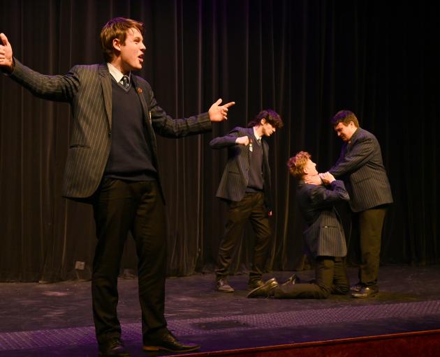 Zac Bell (front) performs a scene from Romeo and Juliet with fellow King’s High School pupils ...