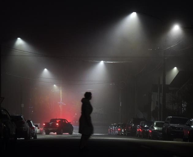 Some of Dunedin’s new LED lights shine through the fog at the intersection of Royal Tce and...