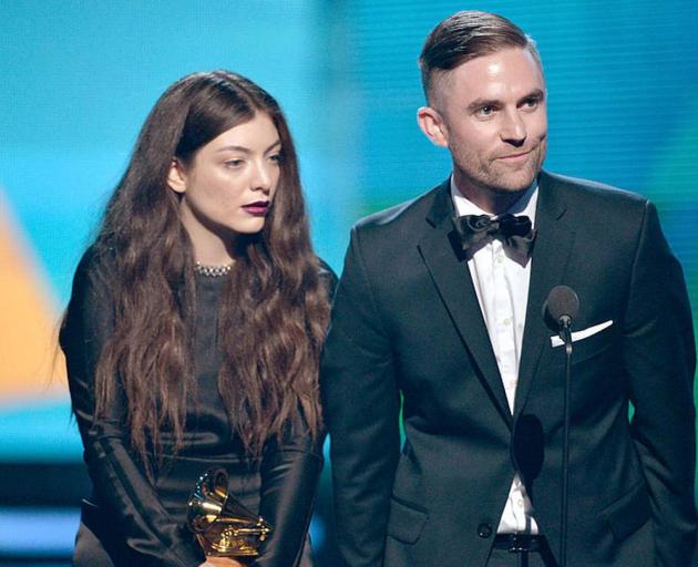 Singer Lorde and songwriter Joel Little accept the Best Pop Solo Performance award for 'Royals' onstage during the 56th Grammy Awards in 2014. Photo / Getty Images Singer Lorde and songwriter Joel Little accept the Best Pop Solo Performance award for 'Royals' onstage during the 56th Grammy Awards in 2014. Photo / Getty Images