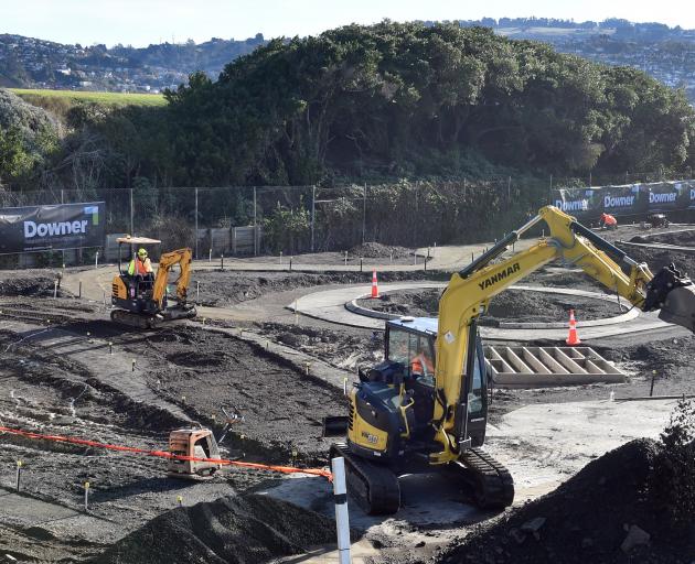 Contractors dig up the learn-to-ride track at Marlow Park on Tuesday to make way for a new...
