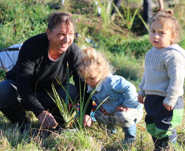 Spending the day together helping plant native species at the Waitaki Community Gardens are...