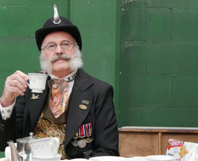 When it comes to tea duelling, the contest’s ‘‘tiffin’’ Colonel Sir Julius Hawthorne does not...