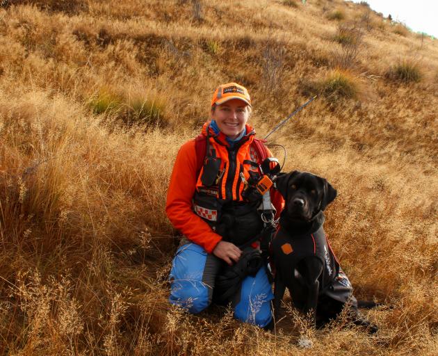 Handler Bridget Martin and Labrador Spaniel search and rescue dog Stag. PHOTO: DANIEL ALVEY