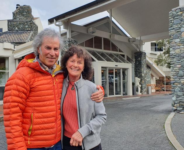 Jef Desbecker, with wife Robina Bodle, argued granting a permit to take water from two Arrow...