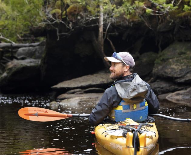 Wanaka filmmaker Richard Sidey kayaks during a trip around Stewart Island last September. The...