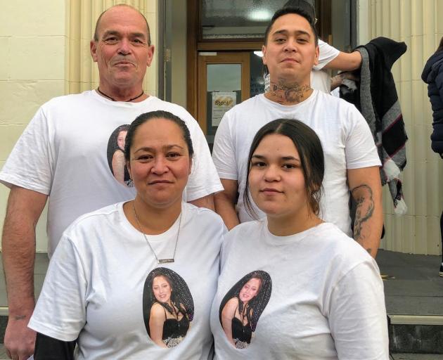 Members of Azalia Wilson’s family, mother Trinette Wilton (front left) and sister Crystal Wilton...