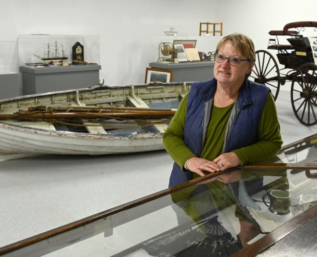 Waikouaiti District Museum Society chairwoman Shirley McKewen looks at the heritage collection...