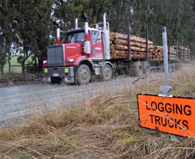 A logging truck travels in Owaka Valley last week.


