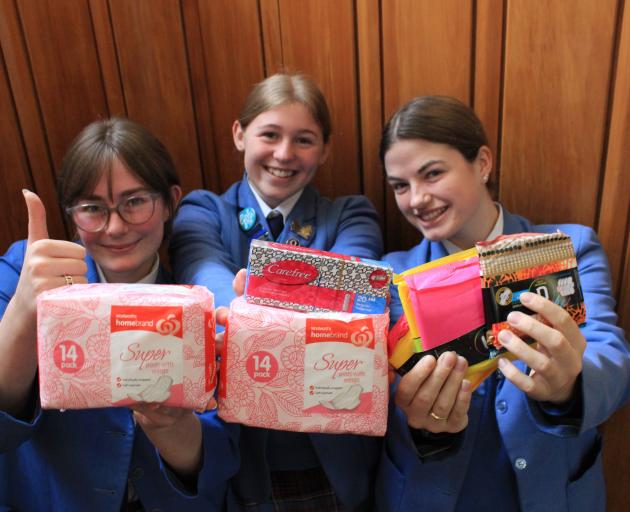 Queen’s High School prefects (from left) Emma Robertson, Chloe Wood and Daisy Kitto-Thomas (all...