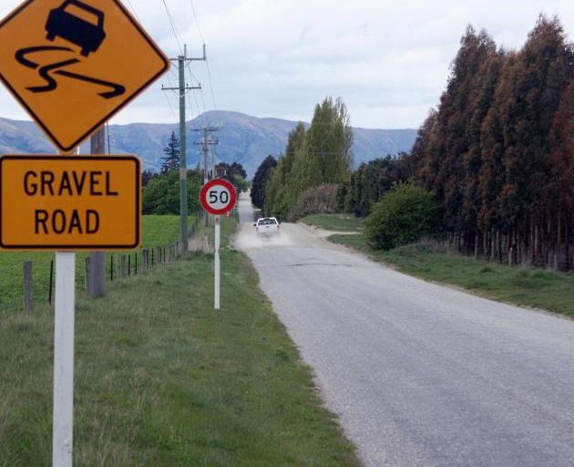 A sign warns of changes in the surface of Ballantyne Rd. Photo: Tim Miller (file)