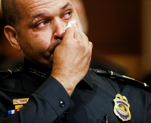 An emotional US Capitol Police sergeant Aquilino Gonell told the hearing Donald Trump was...