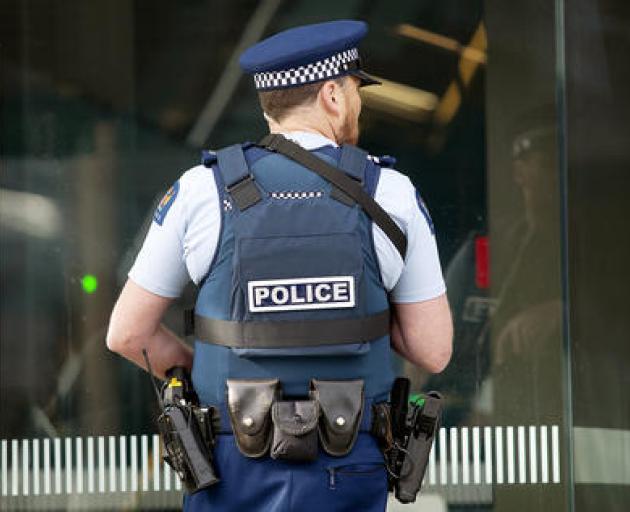 An armed police officer in Christchurch. Photo: Geoff Sloan