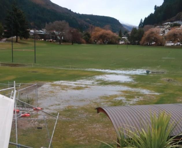 The western end of the Queenstown Rec Ground was waterlogged on Wednesday morning after a...