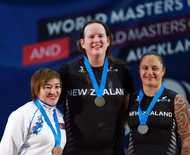 New Zealand’s Laurel Hubbard (centre) won a gold medal competing in the 
...