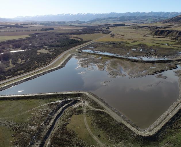 A pair of fortress-like irrigation ponds are ‘‘future-proofing’’ the Hore farm near Omakau for...