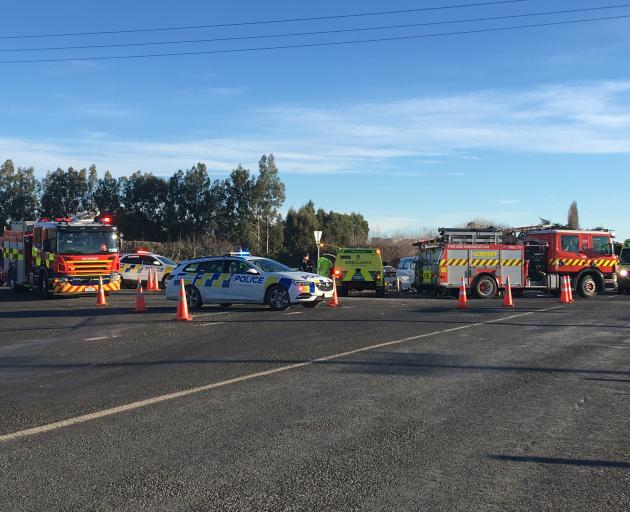 Emergency services at the scene of the crash in Mosgiel this afternoon. Photo: Christine O'Connor