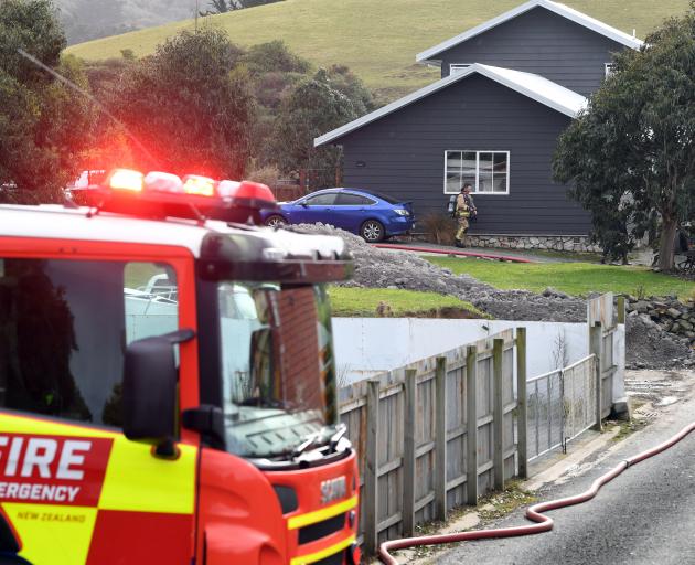 Fire crews at the scene earlier today. Photo: Stephen Jaquiery Fire crews at the scene earlier today. Photo: Stephen Jaquiery