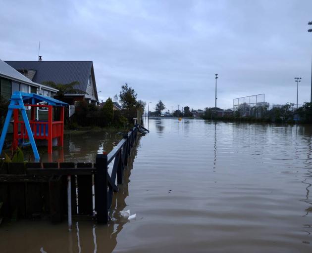 Westport at first light today, with most homes under water and abandoned. Photo: NZ Herald