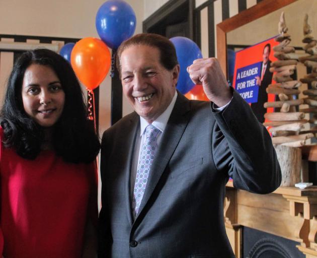 Sir Tim Shadbolt celebrates his re-election as Invercargill Mayor with his partner Asha Dutt in...