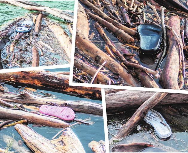 Broken jandals and pieces of footwear caught in debris in Lake Roxburgh. PHOTOS: SHANNON THOMSON