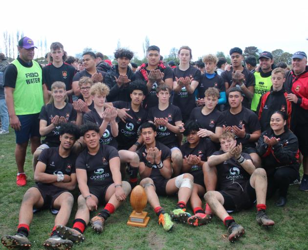 Waitaki Boys’ High School players celebrate after their win over St Kevin’s College in the Blood...